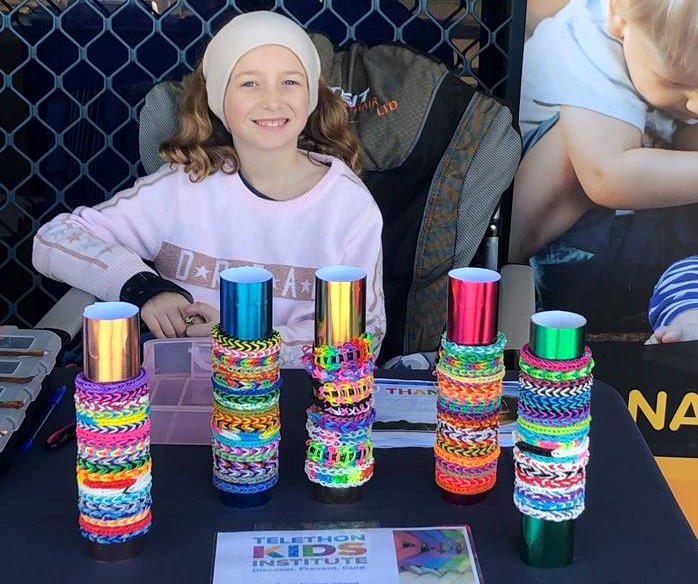 Isabelle sells her loom bands at the markets in support of Telethon Kids