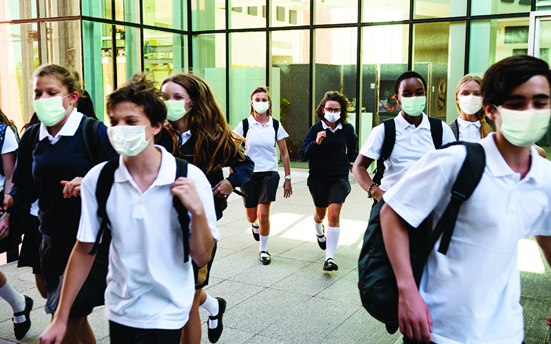 high-school-students-wearing-masks-their-way-home.jpg